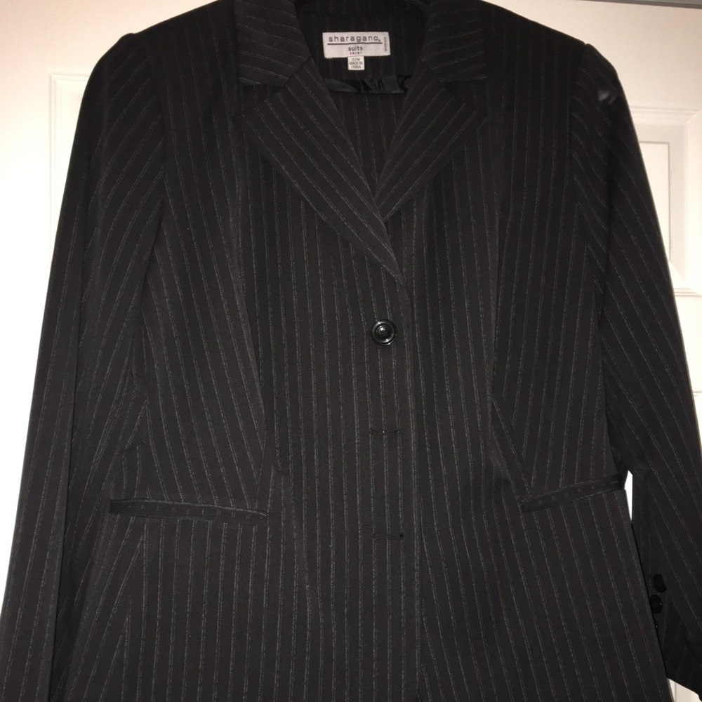 Black pin striped pants suit